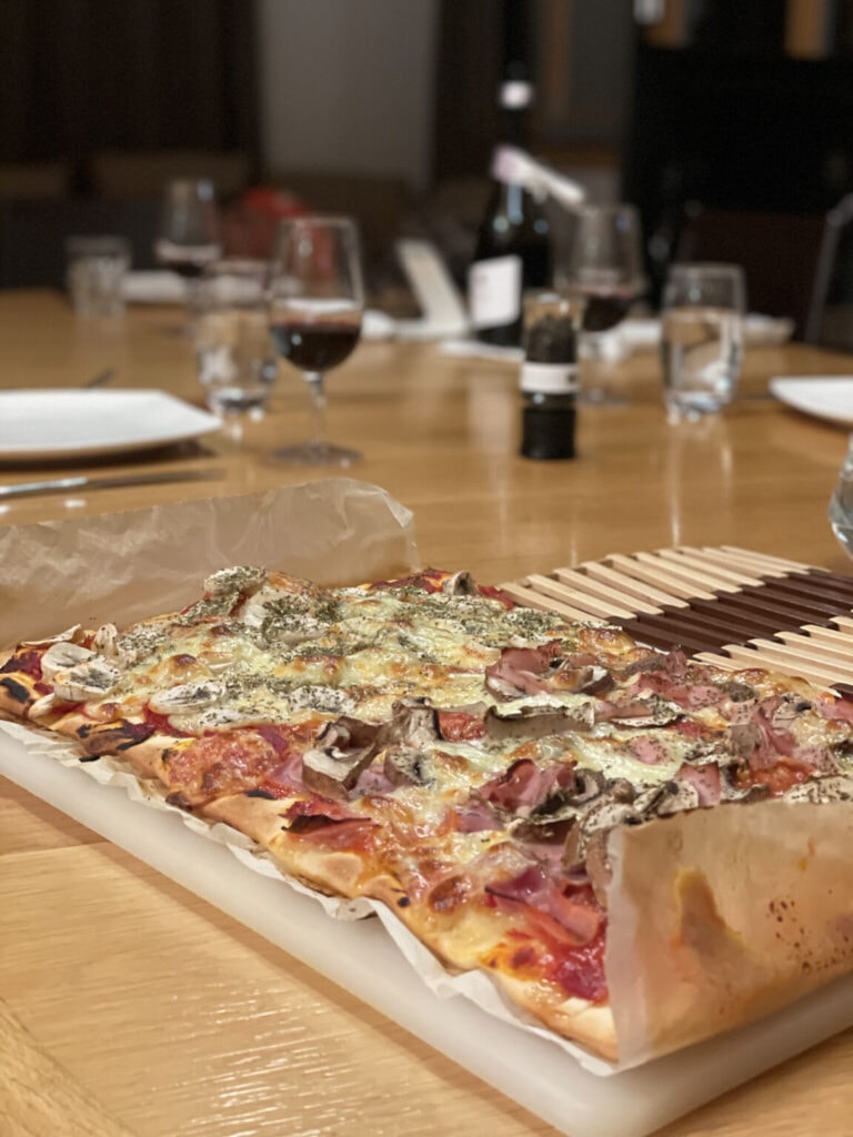 Pizzas with banana on top on the tray