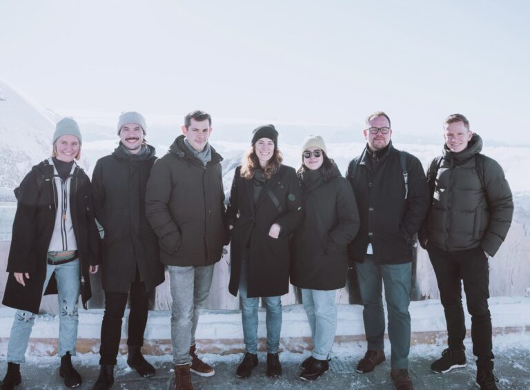 a group of people posing for a photo