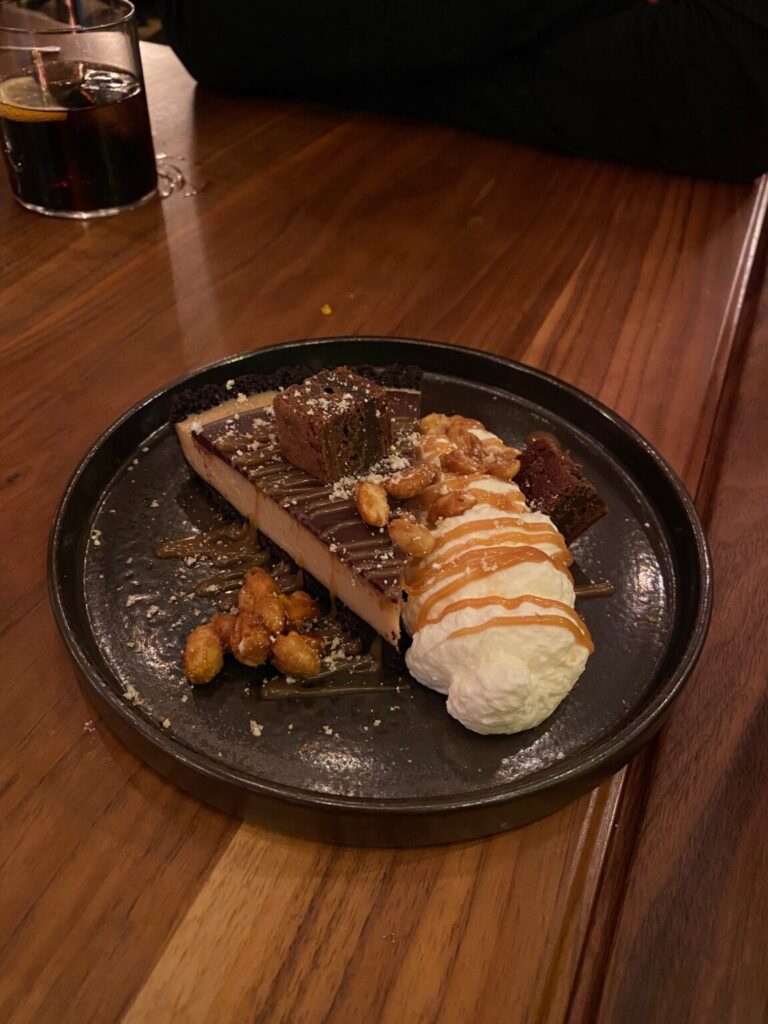 a bowl of food on a plate on a table