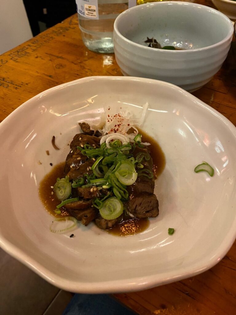 a plate of cucumber and soy salad