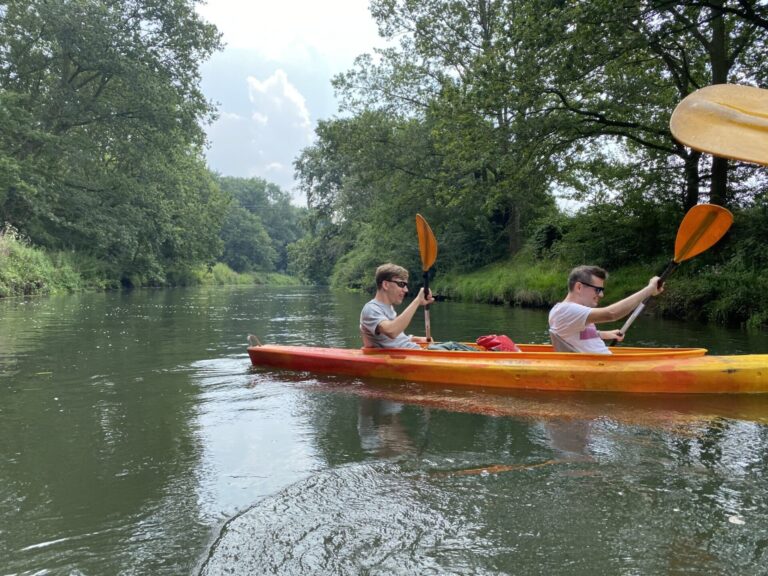 Dominik and Ulrich in a kayak on the water