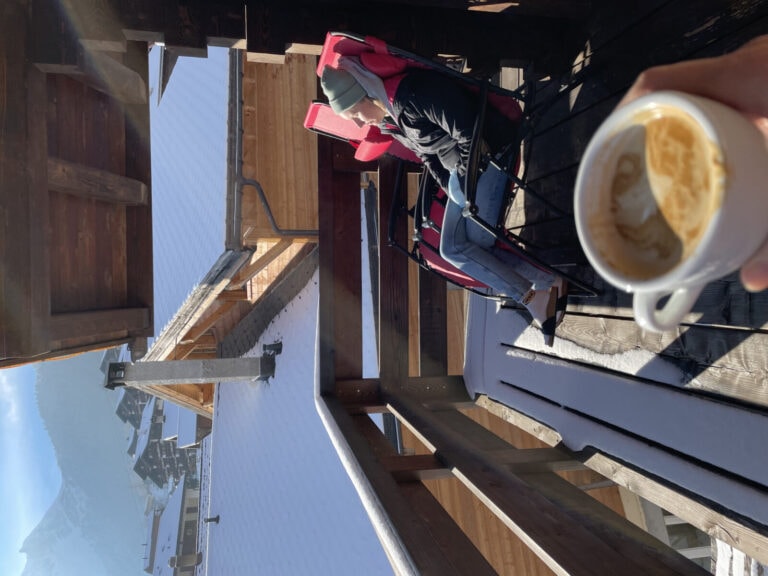Corina sitting on the balcony in the sun