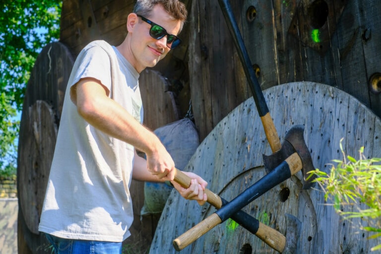Dominik with sunglasses, removing the axe