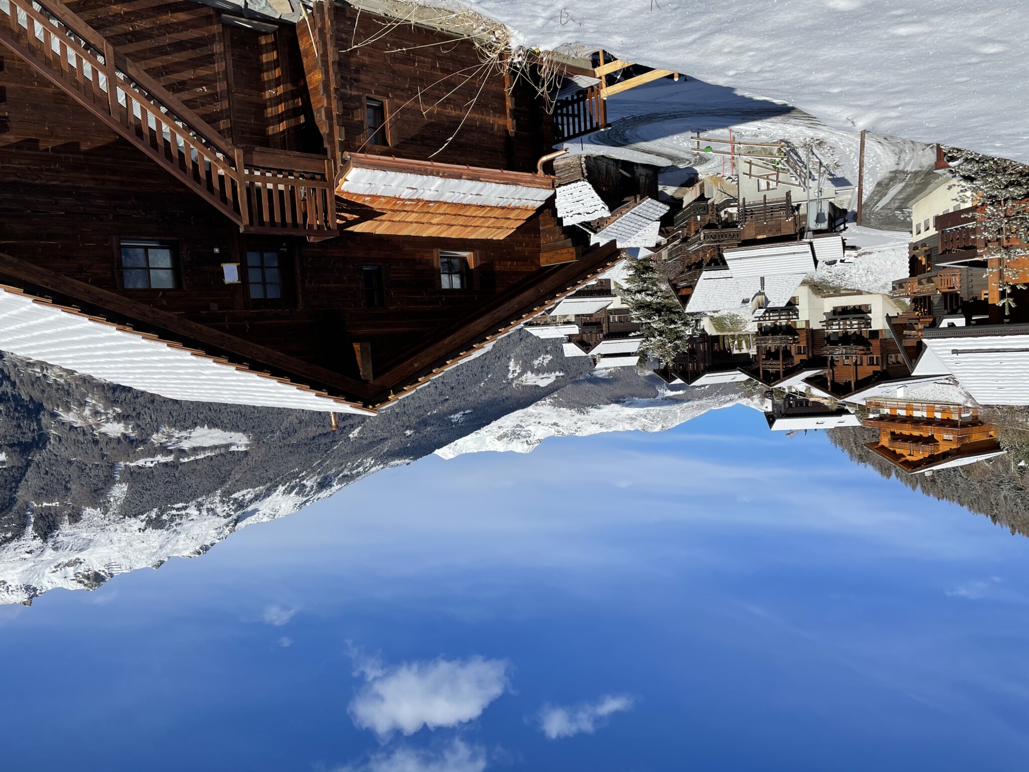 The village of Grimentz, in the canton of Valais. Blue sky and snow-covered roofs.