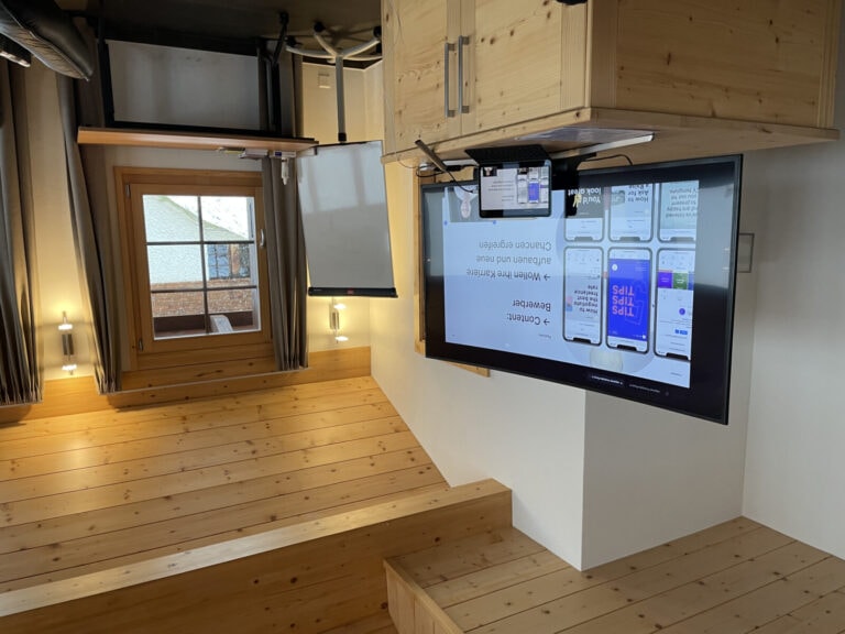 Photo of the screen with a presentation on it