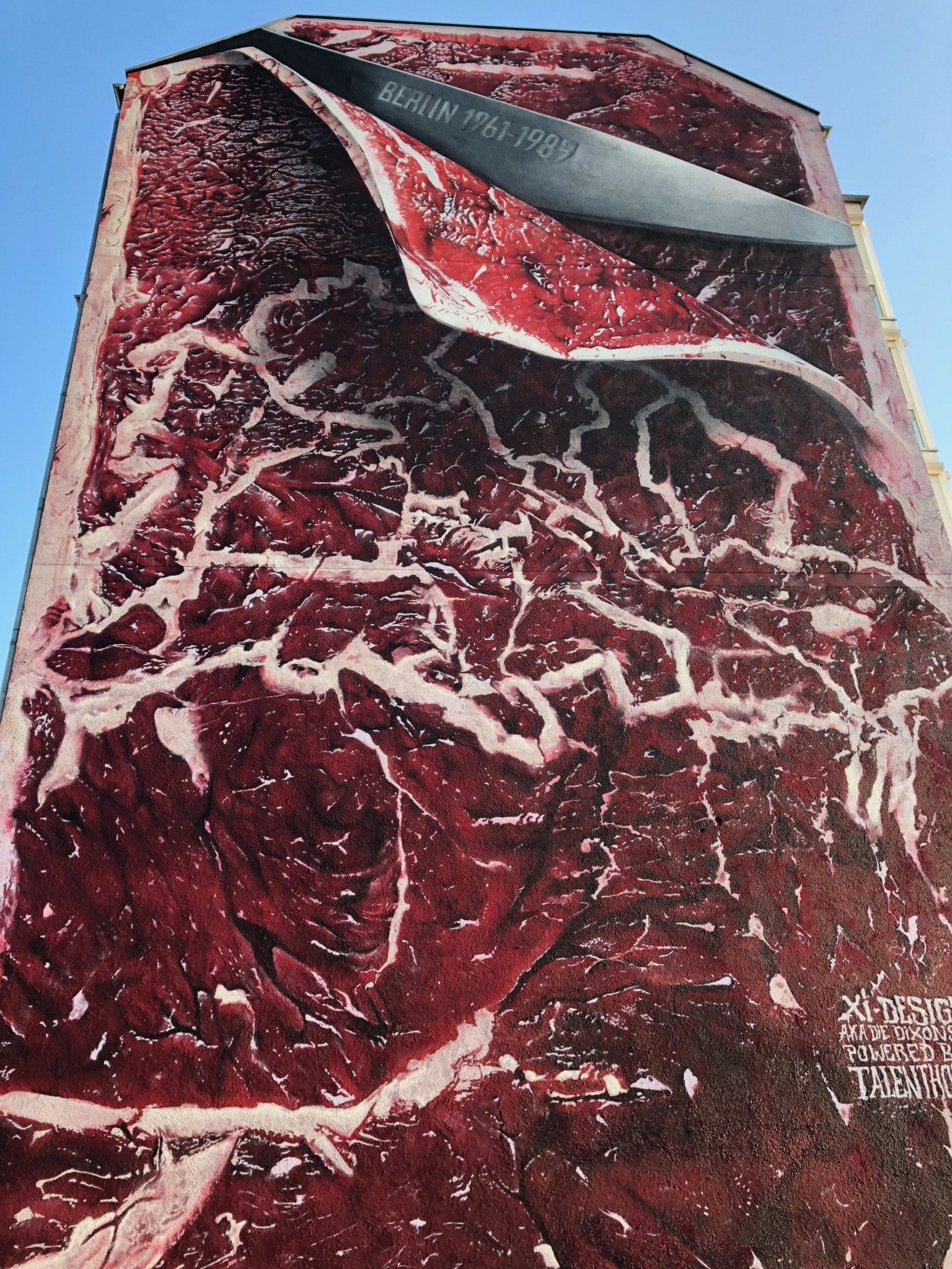 a building cladding that looks like a slice of sliced meat