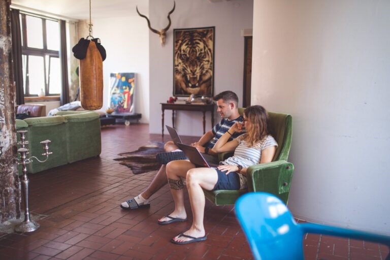 Photo of required team members working on an armchair