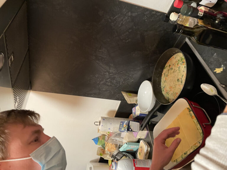 Photo of Ulrich cooking the lasagna
