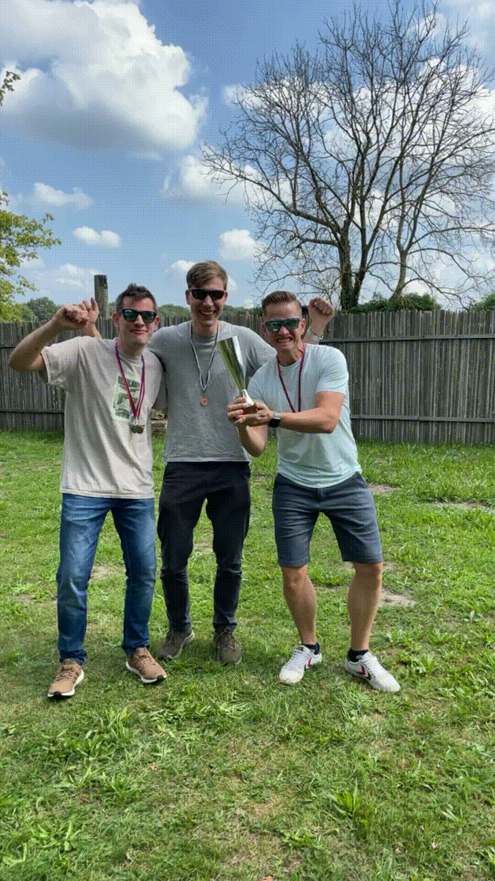Ulrich, Dominik and Paschi at the award ceremony with medals and a trophy
