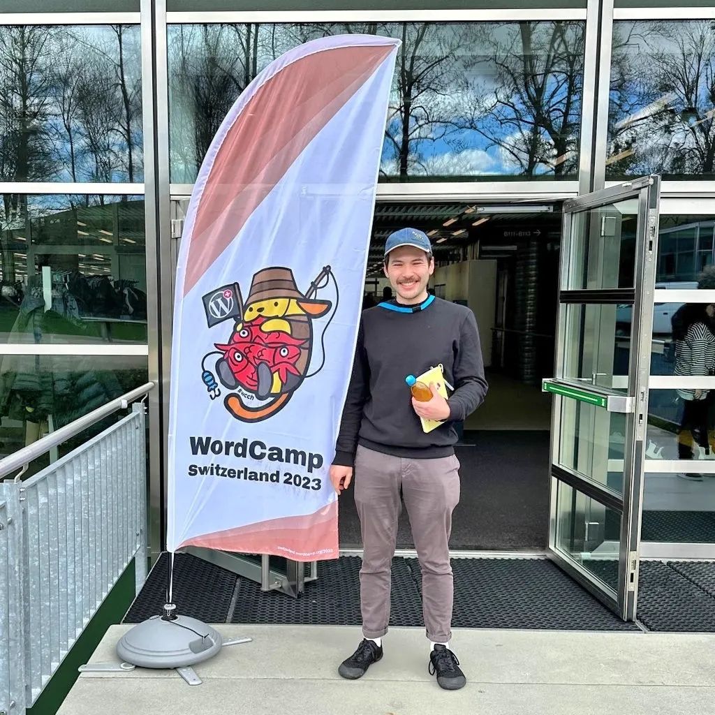 Jeff at the entrance to Wordcamp Switzerland 2023.