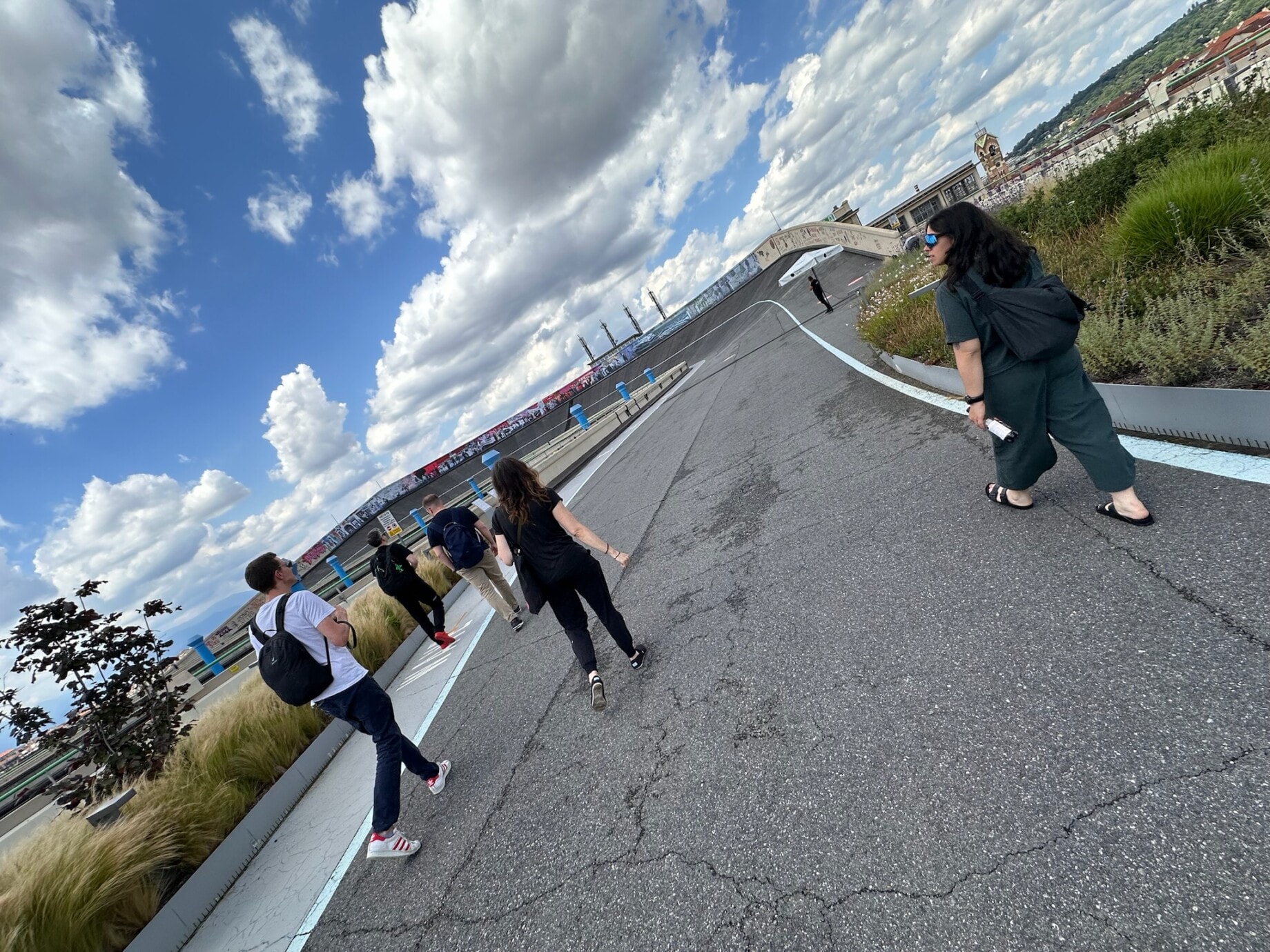 Photo of the team walking on the Fiat test track.