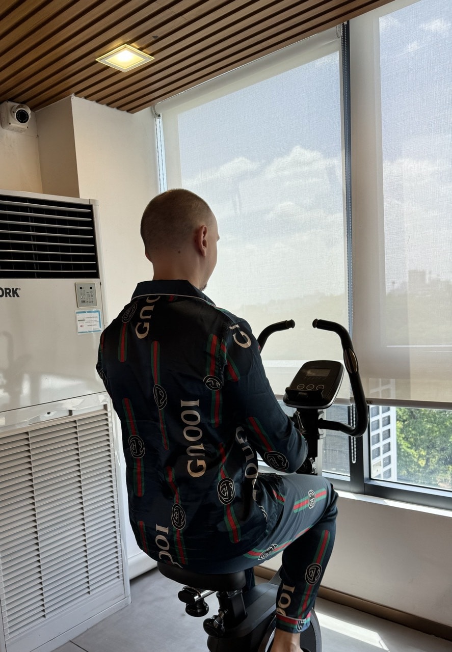 Simon in his pijamas on the home trainer.