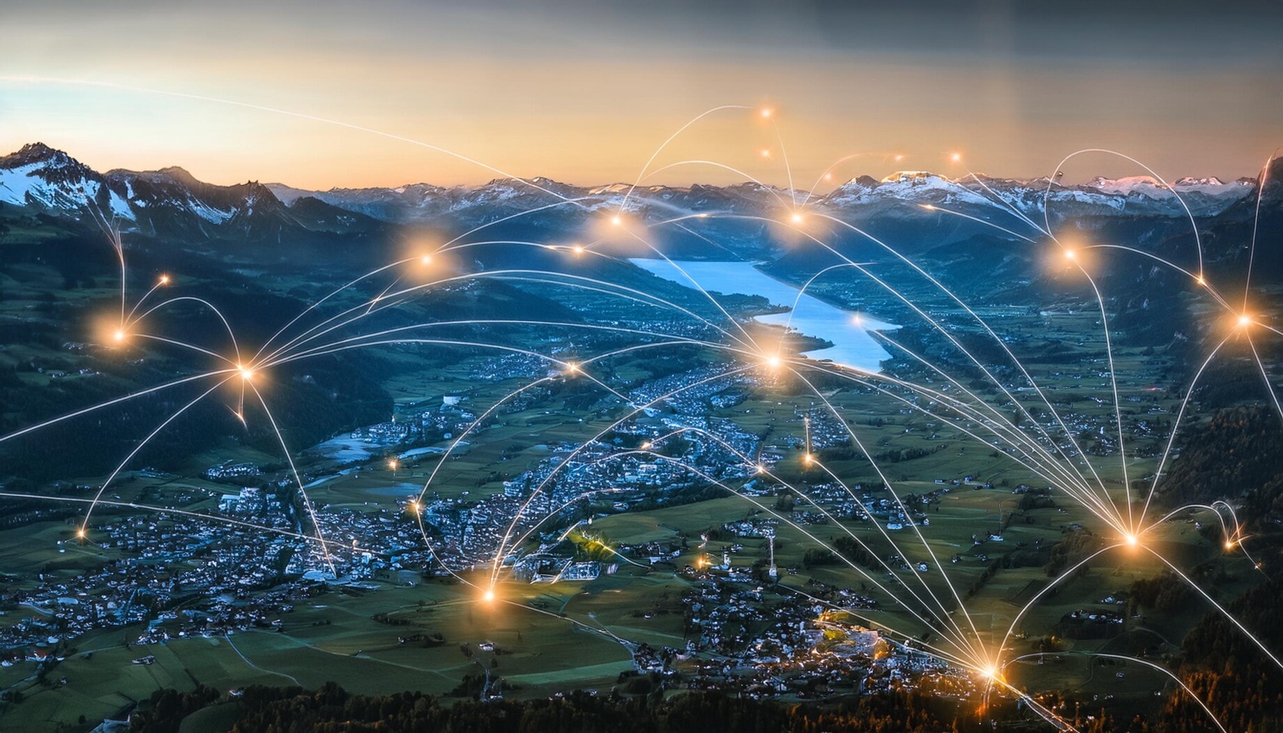 Luftaufnahme einer vernetzten Stadt in der Schweiz, die die Bedeutung von Datenschutz und Digitalisierung im Zusammenhang mit dem revidierten Datenschutzgesetz (revDSG) darstellt.