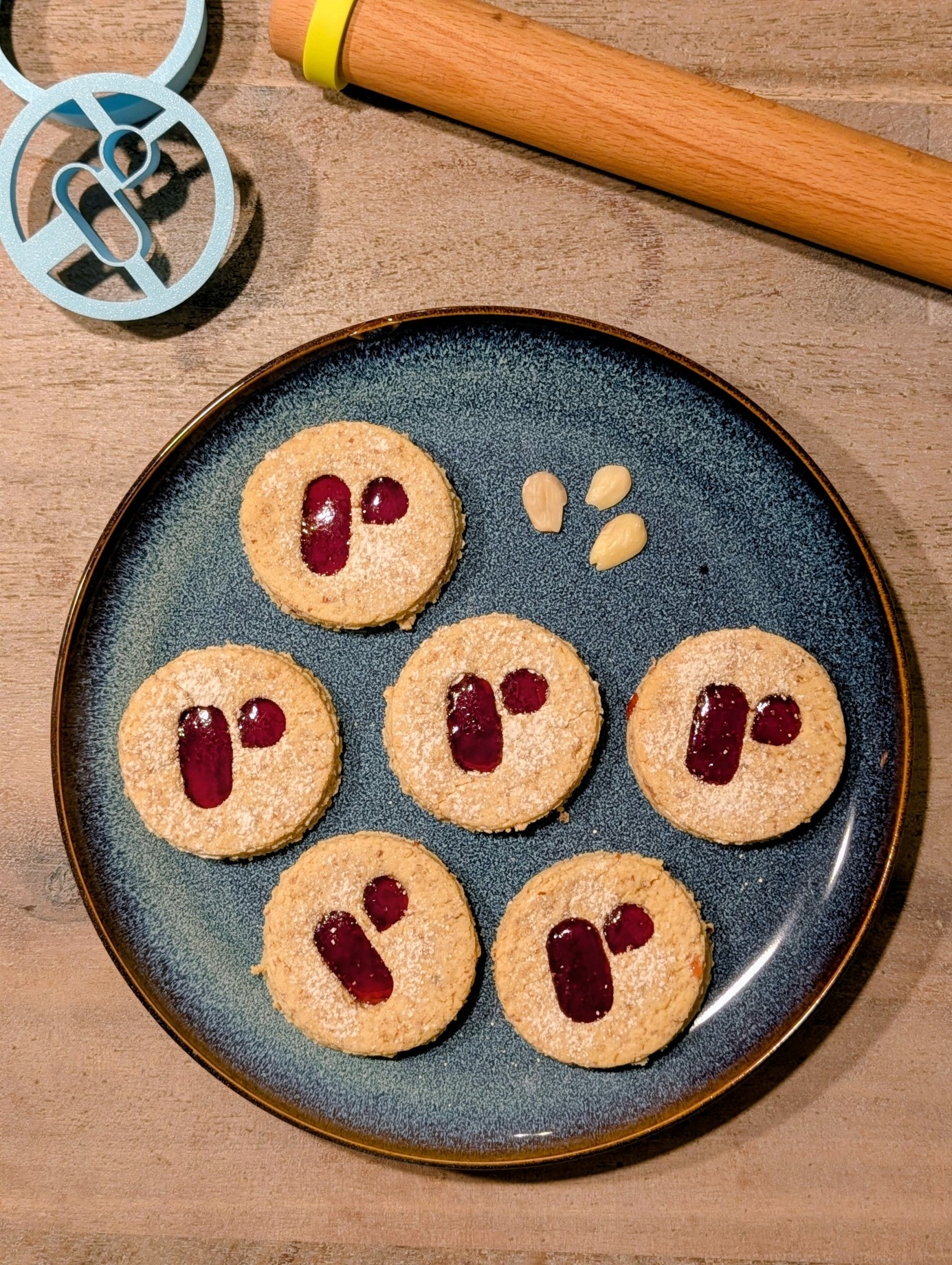 Home-baked Christmas cookies with the requird logo on a plate during the team retreat.
