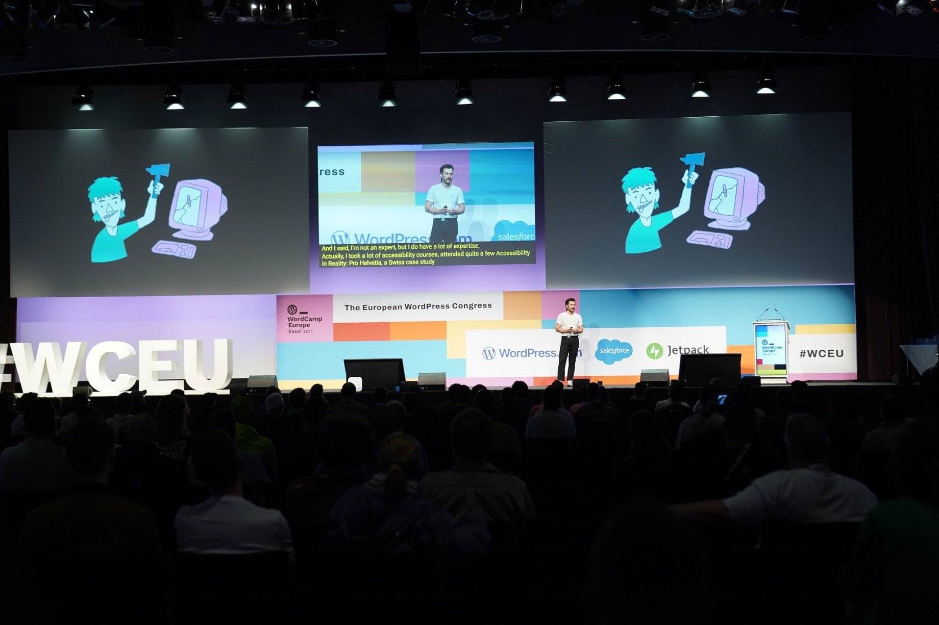 WordCamp Europe 2025 Basel: Stage situation with Jeff and audience, stage illuminated with WCEu logo